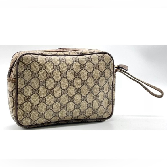 [0062] Vintage Gucci Clutch Wristlet or Toiletry Bag - Picture 2 of 16